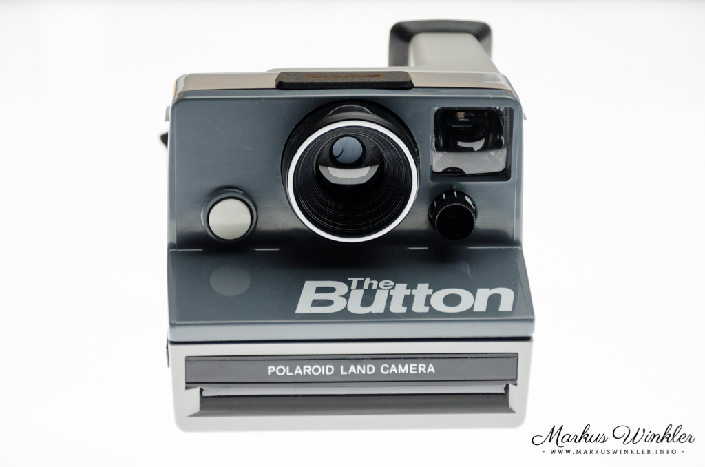 Polaroid The Button - Front